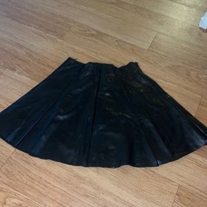 Midi leather black skirt.